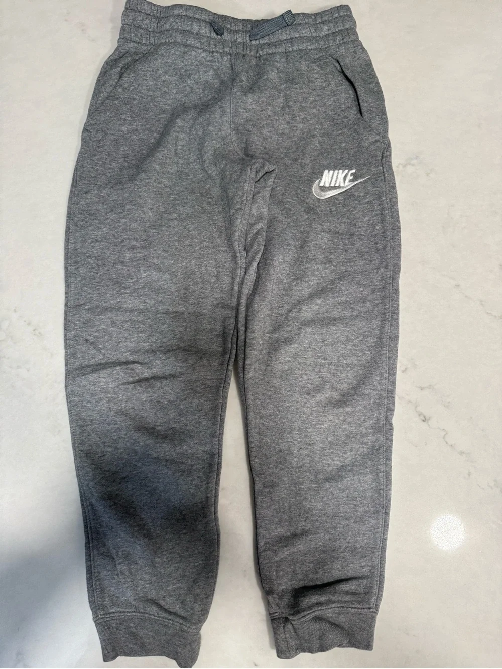 Nike Gray Kids Sweatpants with White Swoosh